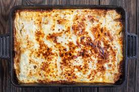 Moussaka Recipe The Mediterranean Dish A Layered Eggplant Casserole With Potatoes And A Hearty Spiced Meat Sauce N Moussaka Recipe Mediterranean Dishes Food