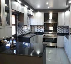 A statement in modern design, large format tiles create a clean, streamlined aesthetic. Granite And Quartz Kitchen Countertops Kitchen Cupboards Bedroom Built Ins Bathr Durban Free Classifieds In South Africa