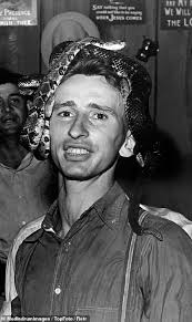 Worshippers wear snakes