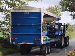 Much-loved farmer escorted down A30 by tractor convoy