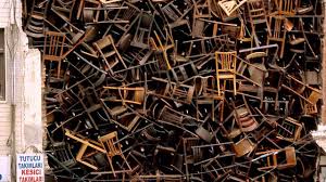 Detail Of Doris Salcedo S Untitled 2003 1 550 Wooden Chairs Approx 10 1 6 1 6 1 M 33 20 20 Ft 8th In Doris Salcedo Guggenheim Museum Guggenheim