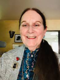 I just finished this brooch with hummingbirds. It is handcarved with a  coping saw and a dremmel.