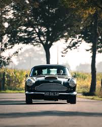 Image result for Pale Primrose 1957 Aston Martin