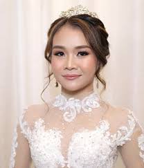 Makeup by Marie Ernest added a...