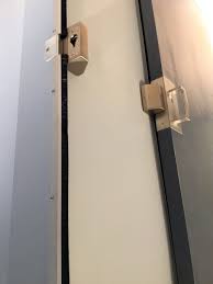The latch is concealed back inside the door when retracted. Cavilock Barn Door Strike