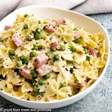 This casserole is then topped with breadcrumbs and baked until bubbly and golden. Easy Bow Tie Ham And Peas Pasta