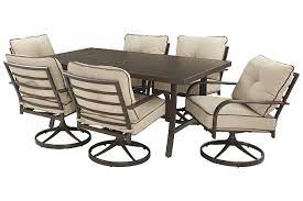 The deep comfort of the cushions and the gentle angle of the backrest are going. Predmore 7 Piece Outdoor Dining Set Ashley Furniture Homestore