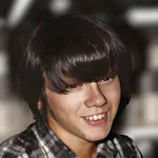 What is the approximate age and value of this guitar?