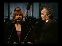 She don't like her eggs all runny / she thinks crossin' her legs is funny / she looks down her nose at money / she gets it on like the easter bunny / she's my baby, i. John Prine In Spite Of Ourselves Lyrics Genius Lyrics