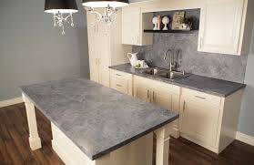 Stained oak cabinets give this cooking space a touch of rugged appeal. Countertop Paint Ideas Give A New Look To The Dated Work Surface