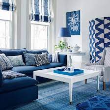 Blue And White Living Room With Cobalt Blue Sofa And Striped Blinds Ideal Home White Living Room Decor Blue Living Room Decor Blue And White Living Room
