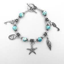 Memorial jewelry made from funeral flowers. Flower Petal Jewelry Preserved Floral Petal Beads Bracelets Pendants Rosaries