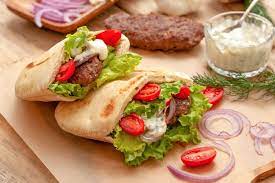 Gyros Are A Classic Greek Sandwich Learn How To Make One Of The World S Great Sandwiches At Home Complete With Lamb Or Bee Greek Recipes Gyro Recipe Recipes