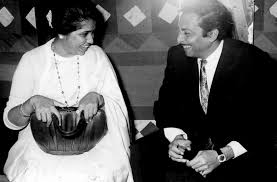 Imprints and Images of Indian Film Music - Madan Mohan recorded a number of  songs with Asha Bhosle, including the popular folk number "Jhumka gira re"  from 'Mera Saaya' (1966) and “Shokh