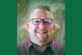 Greg McJannet honoured with International Engagement Service Award