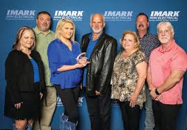 IMARK Announces Member Winners of Distinguished Performance Awards