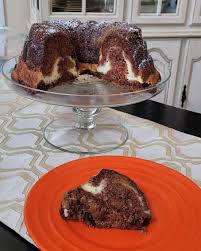 Pour evenly into the prepared pans. Carrot Bundt Cake With Cream Cheese Filling Recipe Allrecipes