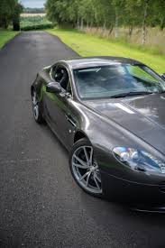 Image result for Titanium Silver 2010 Aston Martin