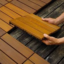 Scrub it well, rinse, and let it dry. 10 Easy To Install Deck Tiles To Help You Create A Backyard Getaway Deck Tiles Deck Tile Backyard Getaway