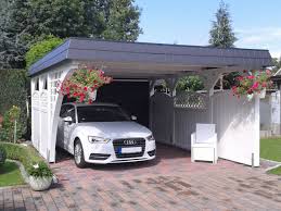 Einzelcarport Mit Komfortbreite Und Einem Bogenpfosten Im Einfahrtsbereich Das Flachdach Wurde Mit Einer Umlaufenden Zw Carport Terrasse Carport Einzelcarport