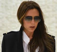 Victoria beckham has a new signature hair look, and we definitely weren't expecting it! How To Wear Bright Orange Flare Pants Like Victoria Beckham