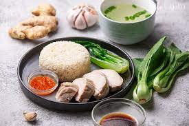 Hainanese chicken rice is well known in malaysia and singapore. Hainanese Chicken Rice Juicy Warm Comfort Much Butter