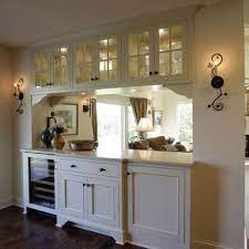 Knocking it down completely would require adding cabinetry or leveling the floor to match the hei… Traditional Kitchen Pass Through Design Ideas Pictures Remodel And Decor Home Decor Kitchen Design Kitchen Pass Kitchen Pass Through
