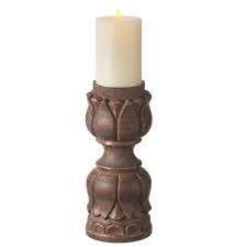 From whimsical animal candle holders to elegant filigree lanterns, there is place your pillar candles on these heavy iron candle trays. Small Hand Carved Wooden Pillar Candle Holder Midwest Cbk