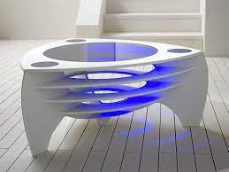 Looking for a contemporary coffee table that you won't get in trouble for putting your feet on? Modern Corian Coffee Tables By Stuart Melrose