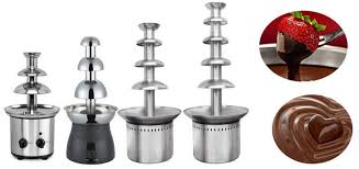 Pink chocolate fountain and yummy hors d'oeuvrs during an evening wedding reception at green river plantation. Chocolate Fountain Machine Making Wonderful Chocolate Food For You