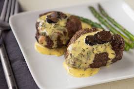 A meal featuring beef tenderloin is a delicious indulgence during this celebratory holiday season. Pan Seared Filet With Sauce Bearnaise And Shaved Black Truffle