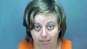 Florida woman, 26, filmed kicking, choking dog with leash is arrested