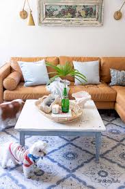 Make sure you measure the top of your coffee table before ordering a tray online or going to a store to shop for a tray. How To Style Decorate A Coffee Table With A Tray Shabbyfufu Com
