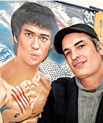 Bruce is alive and kicking butts