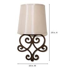 This it's exciting lighting, battery powered this it's exciting lighting, battery powered led wall sconce is the perfect solution for those areas that do not have an electrical outlet. It S Exciting Lighting Heart Bronze Wall Scroll Integrated Led Battery Operated Indoor Wall Sconce With Tan Fleck Shade Iel 6400 Tfbz The Home Depot