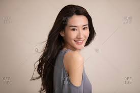 It is characterized by higher levels of the dark pigment eumelanin and lower levels of the pale pigment pheomelanin. Chinese East Asian Brown Hair Stock Photos Offset