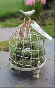 First freezing cold, then snow. Decorating With Birdcages 12 Creative Ideas For Everyday Use Tidbits Twine Bird Cage Decor Bird Cage Centerpiece Bird Cage