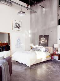 How To Style An Insanely Cool Loft Bedroom Even If You Don T Live In One Industrial Bedroom Design Concrete Bedroom Bedroom Flooring