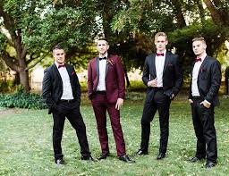 Black And Burgundy Groomsmen Suits Elegant Burgundy Wedding Inspiration Inspired By This Groom Wedding Attire Wedding Suits Groom Burgundy Wedding