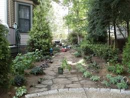 Mahoney S Garden Center Low Maintenance Garden What About These Types Of Stone As A Fire Pit Area Low Maintenance Garden Backyard Fire Pit Area