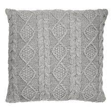 Get cozy with this overstuffed throw pillow topped with soft + fuzzy chunky cable knitting at the front and finished with woven back complete with hidden zipper. Cable Knit Throw Pillow Wayfair