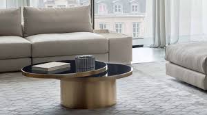 This table offers a full extending top that functions as a comfortable work surface perfect for activities such as working on your computer, dining or crafting. Space Coffee Tables