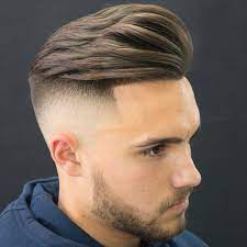 The mid fade is a taper cut that is above the ear but below the temples. Mid Fade Corte Low Fade Medio Novocom Top