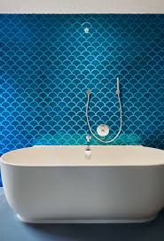Porcelain and laminated stoneware bathroom tiles for a welcoming and modern space. Member News Hotel Designs