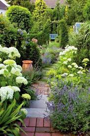 Give Your Long And Narrow Garden The Organic Wow Factor By Going Organic Garden Paths Beautiful Gardens Cottage Garden