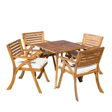 Our patio table sets are built to last and designed to withstand the outdoor elements year round the cement barn's patio table sets are cast out of quality concrete materials and reinforced with. Best Selling Home Decor Indira Patio Dining Set Acacia Wood Set Of 5 296620 Rona