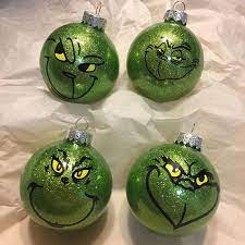 Glitter Ornament With Grinch Face The Ornament Is Glass And Approxima Christmas Tree Ornament Crafts Grinch Christmas Decorations Diy Christmas Tree Ornaments