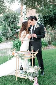 Shop vangelo men dress shoe tux 3 oxford formal tuxedo for. Outdoor Brunch Breakfast Wedding Champagne Cart Bubbly Bar With Gold Vintage Bar Cart And Fresh Berries Lace Mermaid Long Sleeve Bridal Gown Wedding Dress Groom In Classic Black Suit Tux
