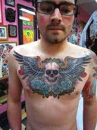 Pin On Chest Tattoos