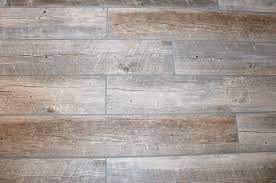 Wide plank flooring is a great option for flooring in a kitchen. Plank Tile Bathroom Flooring Happihomemade With Sammi Ricke